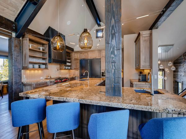 Gourmet kitchen with additional bar seating to enjoy conversations while the cook works their magic