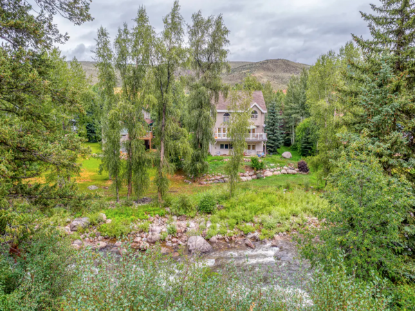 Riverfront condo with Mountain Views
