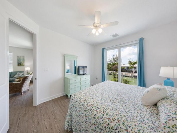 Waterfront 4 Bedroom Home with Pool Dock & View of Canal