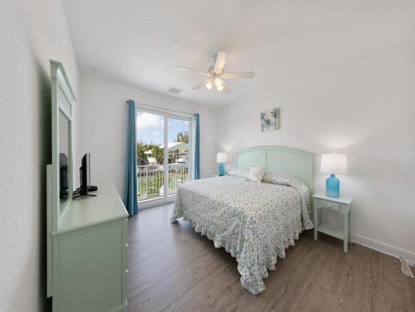 Waterfront 4 Bedroom Home with Pool Dock & View of Canal