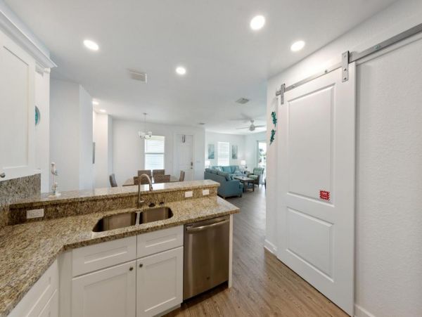 Waterfront 4 Bedroom Home with Pool Dock & View of Canal