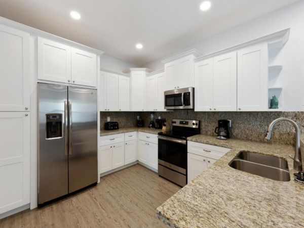 Waterfront 4 Bedroom Home with Pool Dock & View of Canal