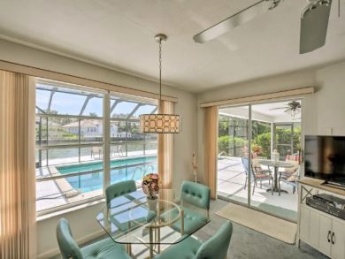 Canal Front 4 Bedroom Home with Private Caged Pool in Naples