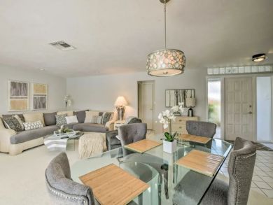 Canal Front 4 Bedroom Home with Private Caged Pool in Naples