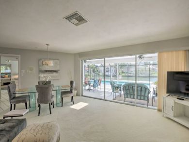 Canal Front 4 Bedroom Home with Private Caged Pool in Naples