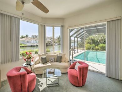 Canal Front 4 Bedroom Home with Private Caged Pool in Naples