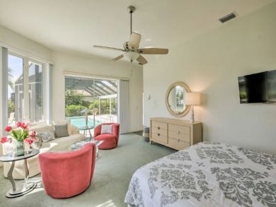 Canal Front 4 Bedroom Home with Private Caged Pool in Naples