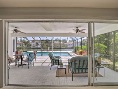 Canal Front 4 Bedroom Home with Private Caged Pool in Naples