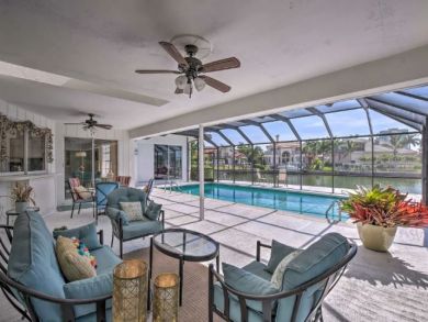Canal Front 4 Bedroom Home with Private Caged Pool in Naples