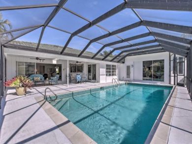 Canal Front 4 Bedroom Home with Private Caged Pool in Naples