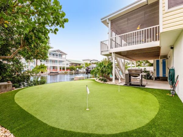 Stunning 4 Bedroom Home on the Canal with Pool and Dock