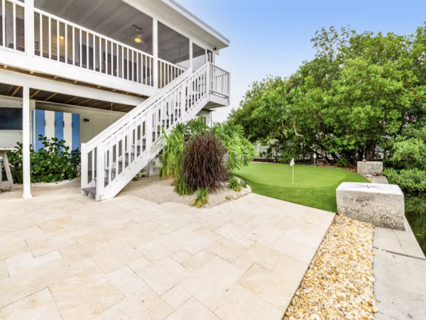 Stunning 4 Bedroom Home on the Canal with Pool and Dock