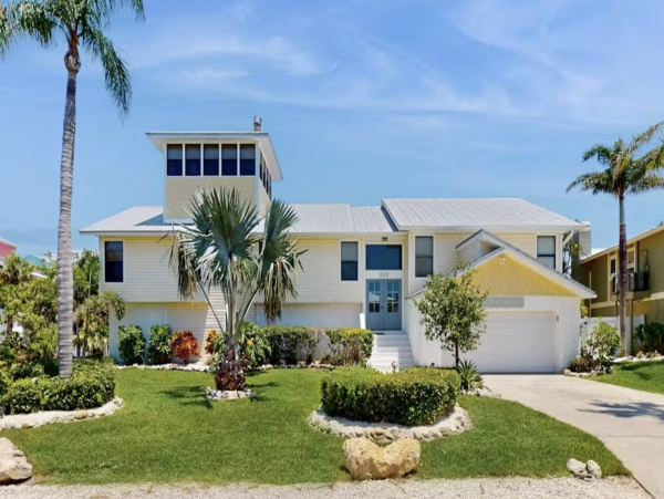 Stunning 4 Bedroom Home on the Canal with Pool and Dock