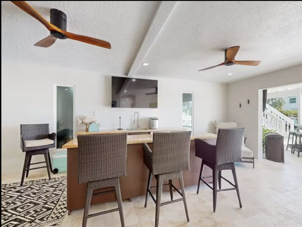 Stunning 4 Bedroom Home on the Canal with Pool and Dock