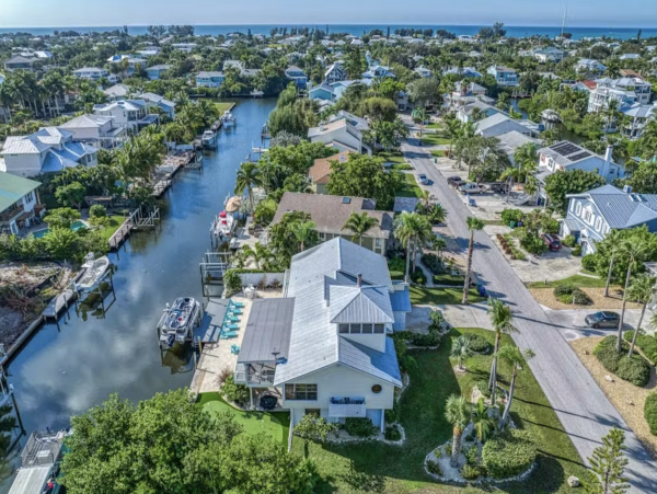 Stunning 4 Bedroom Home on the Canal with Pool and Dock