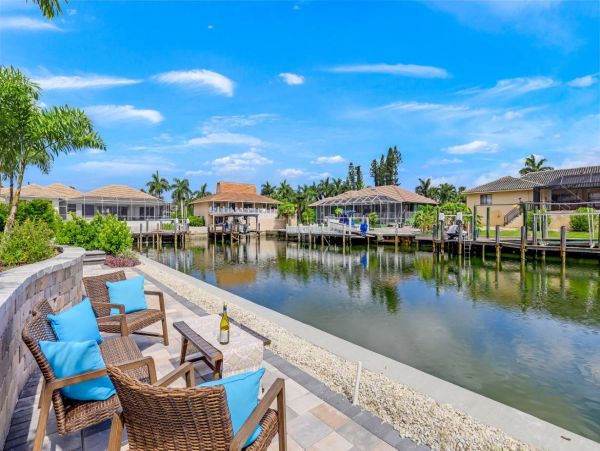 Marco Island Walk to Beach & Canal View Four Bedroom Home