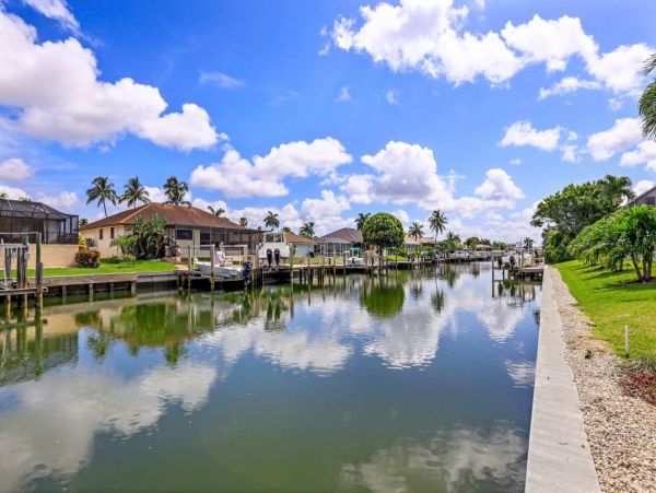 Marco Island Walk to Beach & Canal View Four Bedroom Home