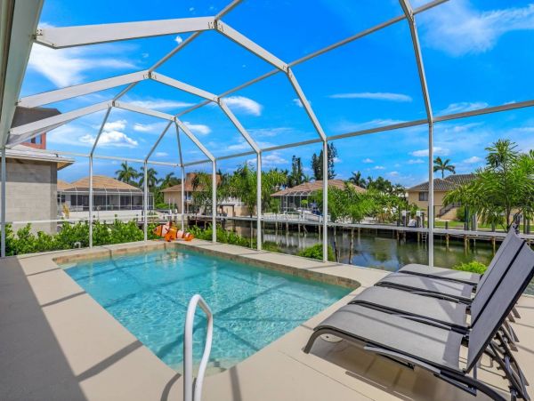 Marco Island Walk to Beach & Canal View Four Bedroom Home