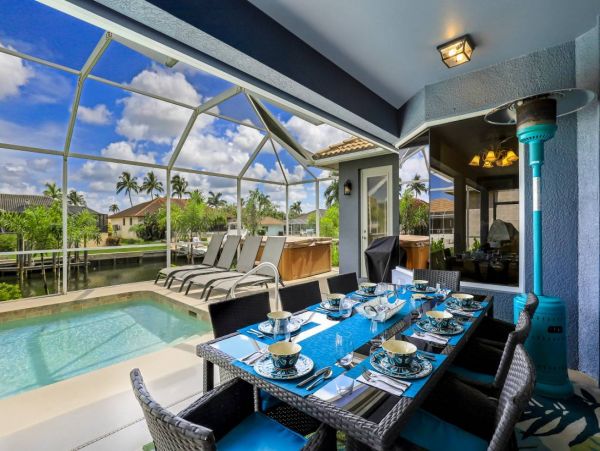 Marco Island Walk to Beach & Canal View Four Bedroom Home