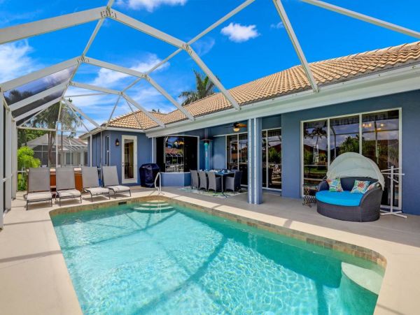 Marco Island Walk to Beach & Canal View Four Bedroom Home