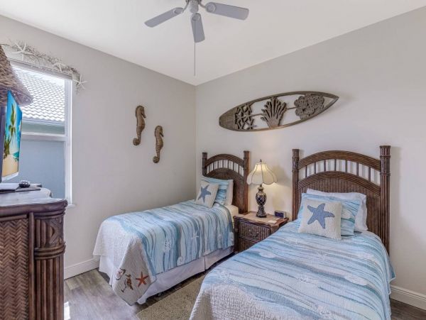 Marco Island Walk to Beach & Canal View Four Bedroom Home