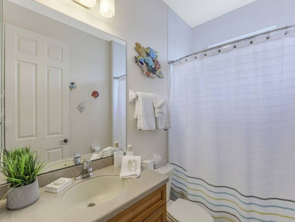 Marco Island Walk to Beach & Canal View Four Bedroom Home