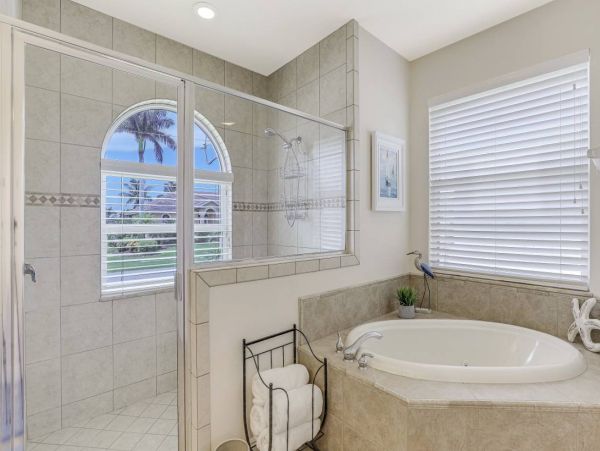 Marco Island Walk to Beach & Canal View Four Bedroom Home
