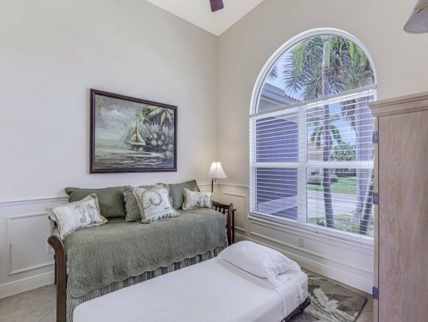 Marco Island Walk to Beach & Canal View Four Bedroom Home