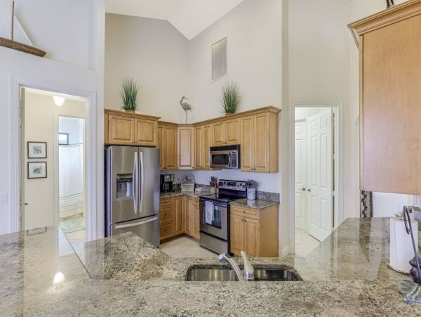 Marco Island Walk to Beach & Canal View Four Bedroom Home