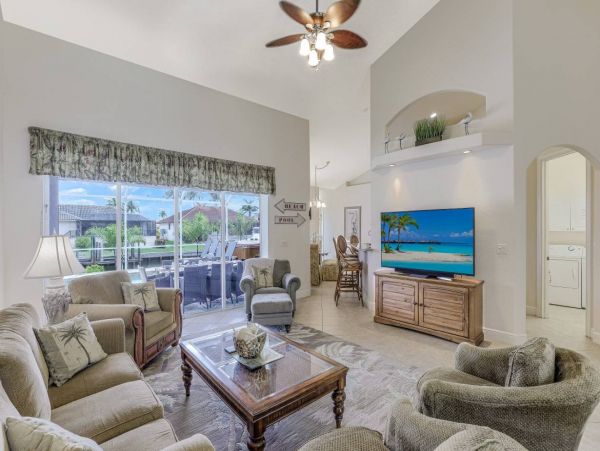 Marco Island Walk to Beach & Canal View Four Bedroom Home
