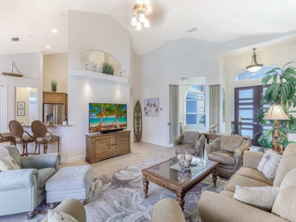 Marco Island Walk to Beach & Canal View Four Bedroom Home