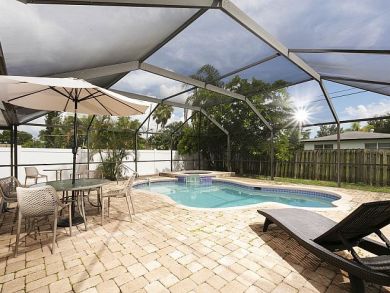 Walk to Beach Four Bedroom Vacation Pool Home in Naples