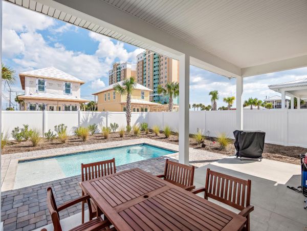 Beautiful 4 Bedroom House with private pool, just steps from the beach.
