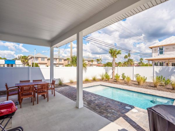 Beautiful 4 Bedroom House with private pool, just steps from the beach.