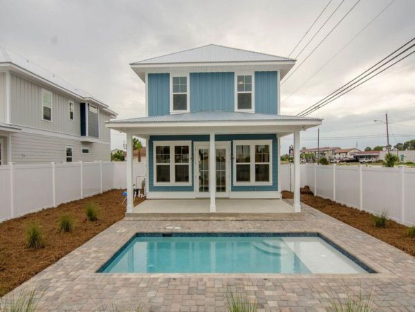 Beautiful 4 Bedroom House with private pool, just steps from the beach.