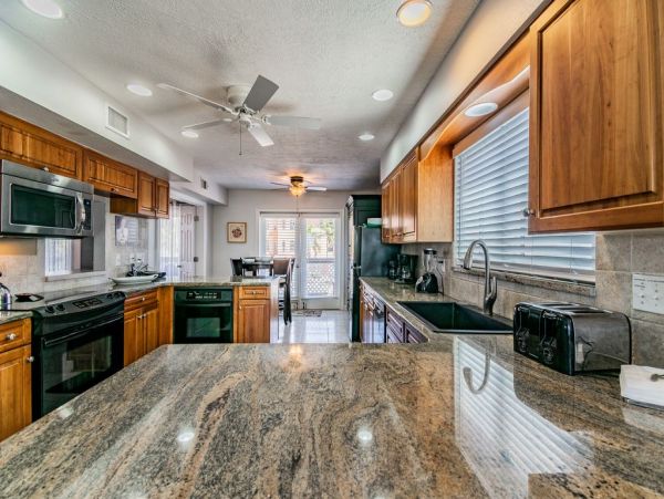 Treasure Island Beachfront Vacation Rental 5-Bedroom Home with Balconies & Pool Table