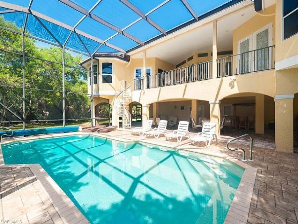 Dazzling Four Bedroom Home with Caged Pool in Sanibel