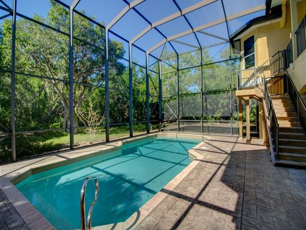 Dazzling Four Bedroom Home with Caged Pool in Sanibel