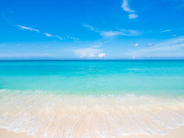 Seven Mile Beach Oceanfront Condo Rental - Grand Cayman Luxury Stay