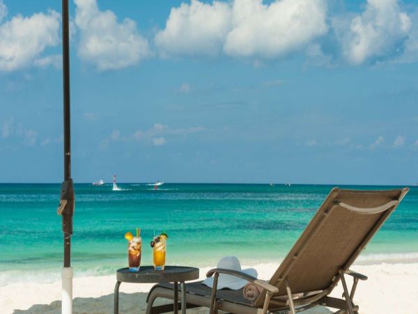 Seven Mile Beach Oceanfront Condo Rental - Grand Cayman Luxury Stay