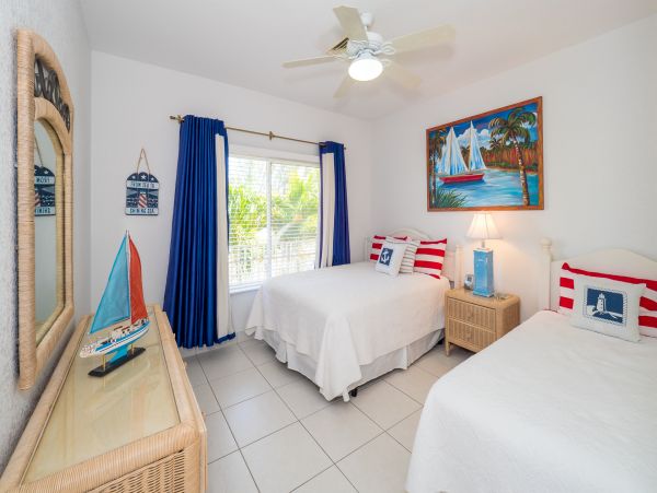 Cayman Kai Beachfront Condo Rental  Luxury Caribbean Vacation Property