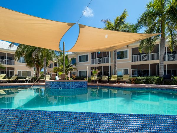 Cayman Kai Beachfront Condo Rental  Luxury Caribbean Vacation Property