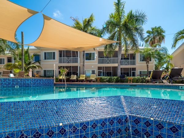 Cayman Kai Beachfront Condo Rental  Luxury Caribbean Vacation Property