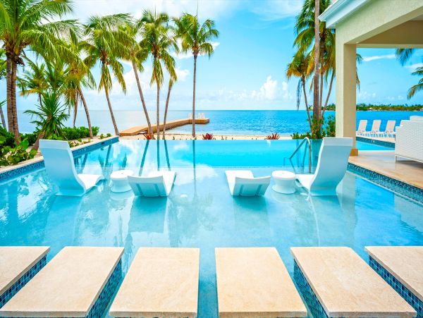 Cayman Kai Oceanfront Villa Rental - Luxury Caribbean Beachfront Home