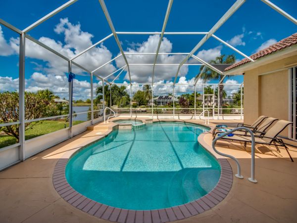 Cape Coral Water Front Vacation Home with Caged Pool & Spa