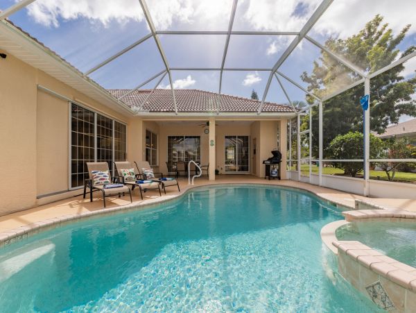 Cape Coral Water Front Vacation Home with Caged Pool & Spa