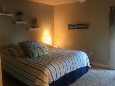 5 minute drive to beach with this 2 /2 canal front condo