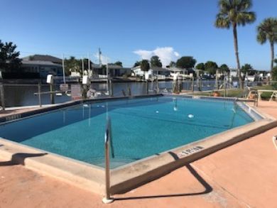 5 minute drive to beach with this 2 /2 canal front condo
