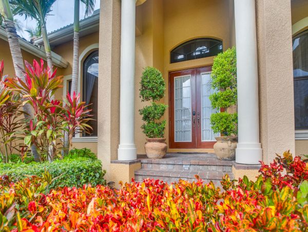 Marco Island 6 Bedroom Canal Front Home with Caged Pool