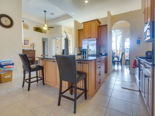 Marco Island 6 Bedroom Canal Front Home with Caged Pool